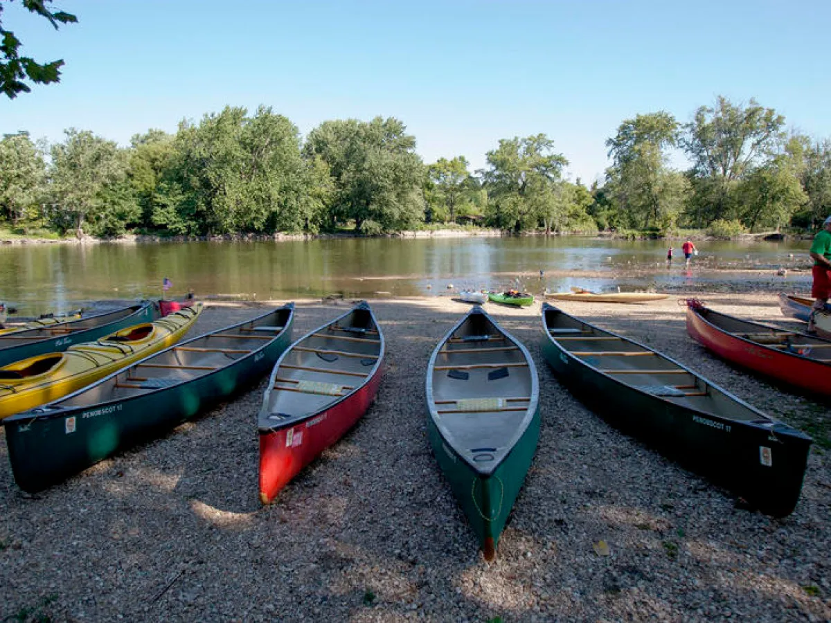 canoes on the river bank