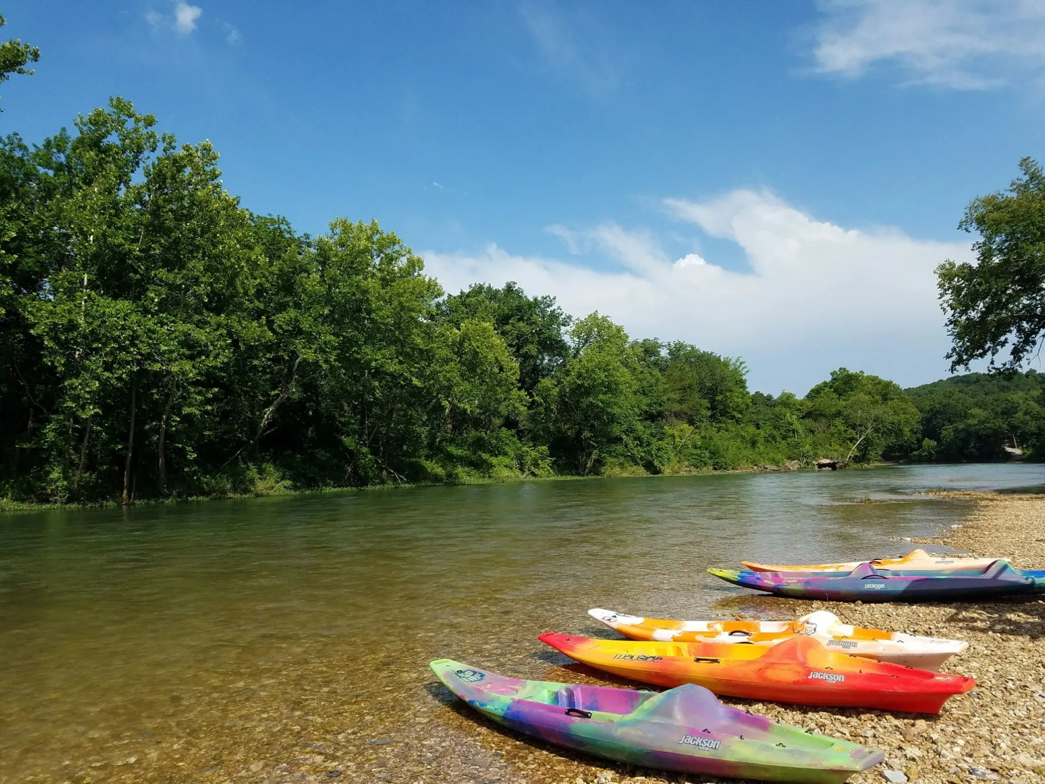 kayaks parked on bank