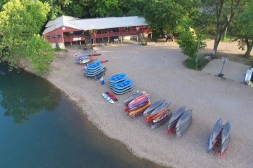 canoes and rafts on shore