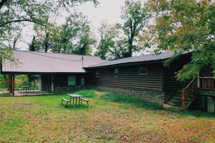 a house with trees in the front yard