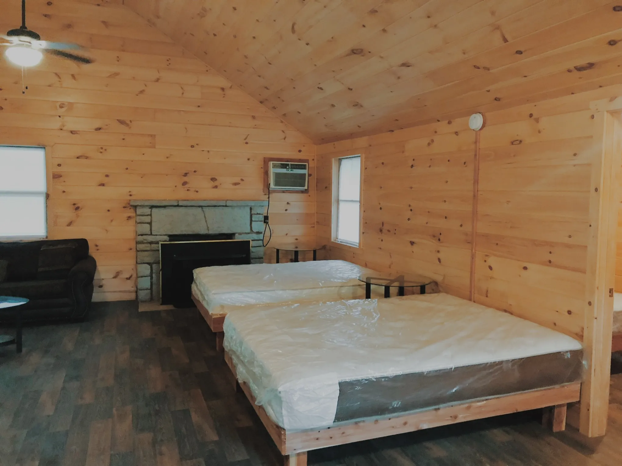 a bedroom with a bed in a room