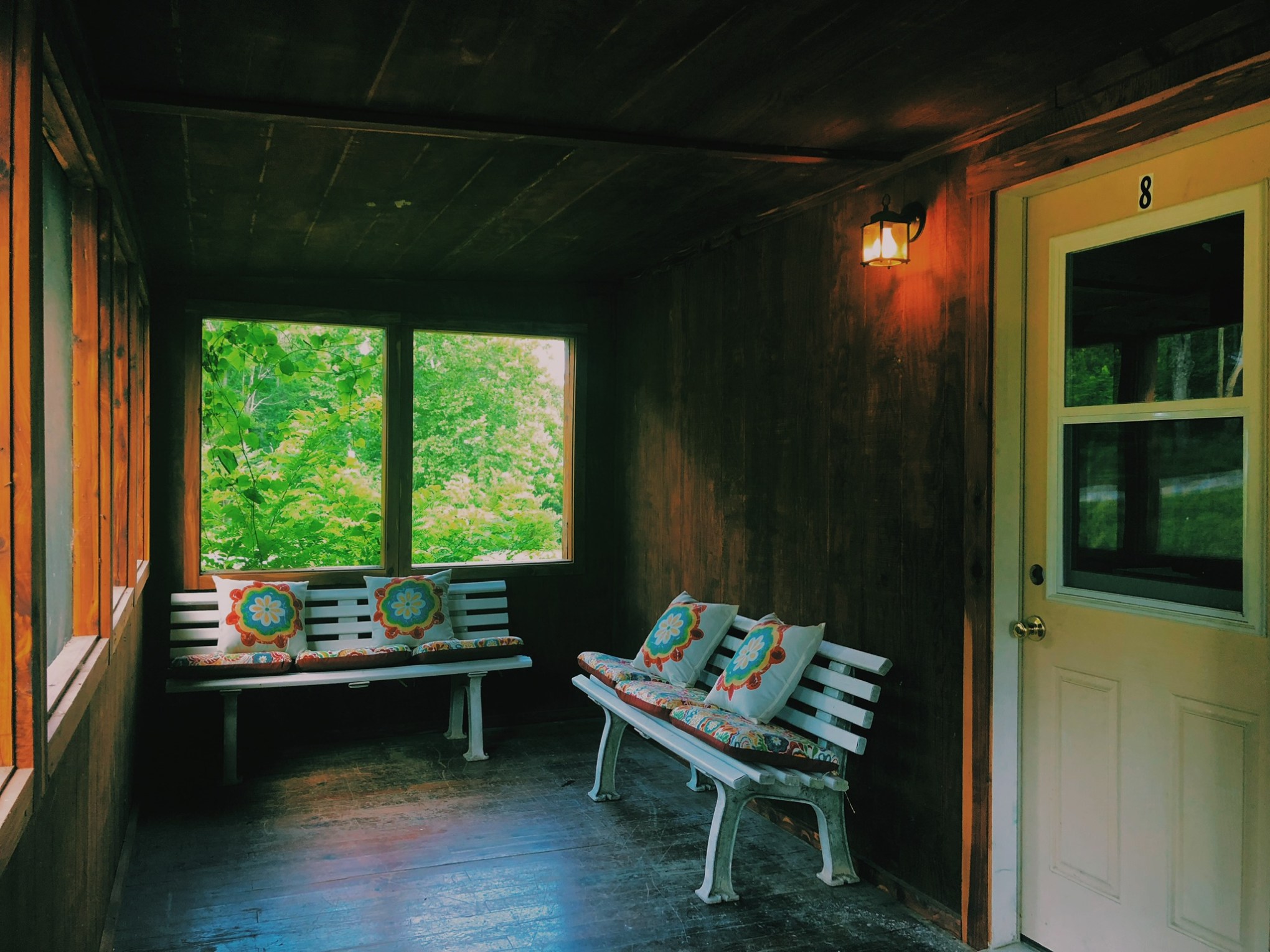 a living room next to a window