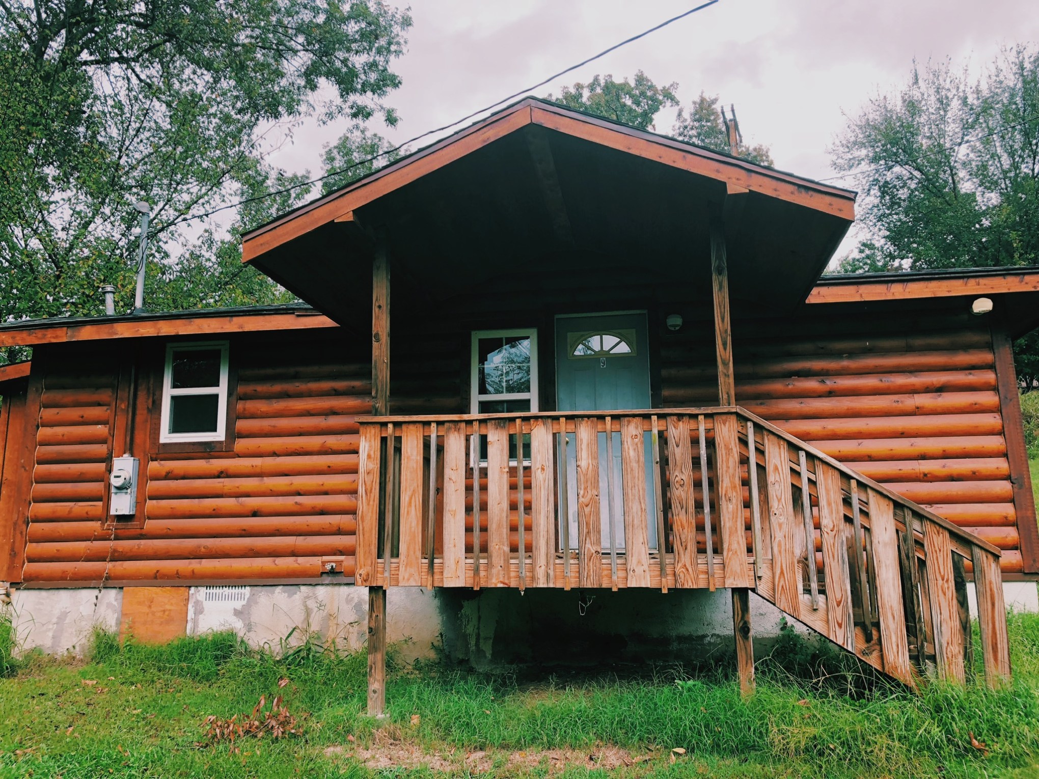 a wooden bench in front of a house