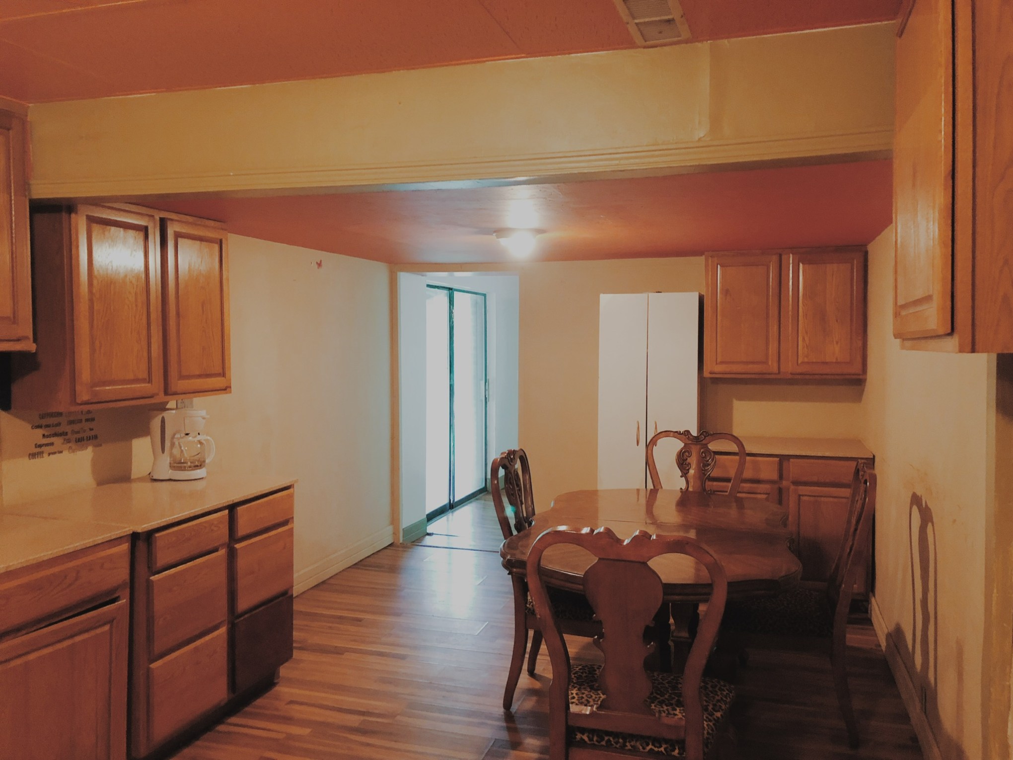 a kitchen with a wood floor
