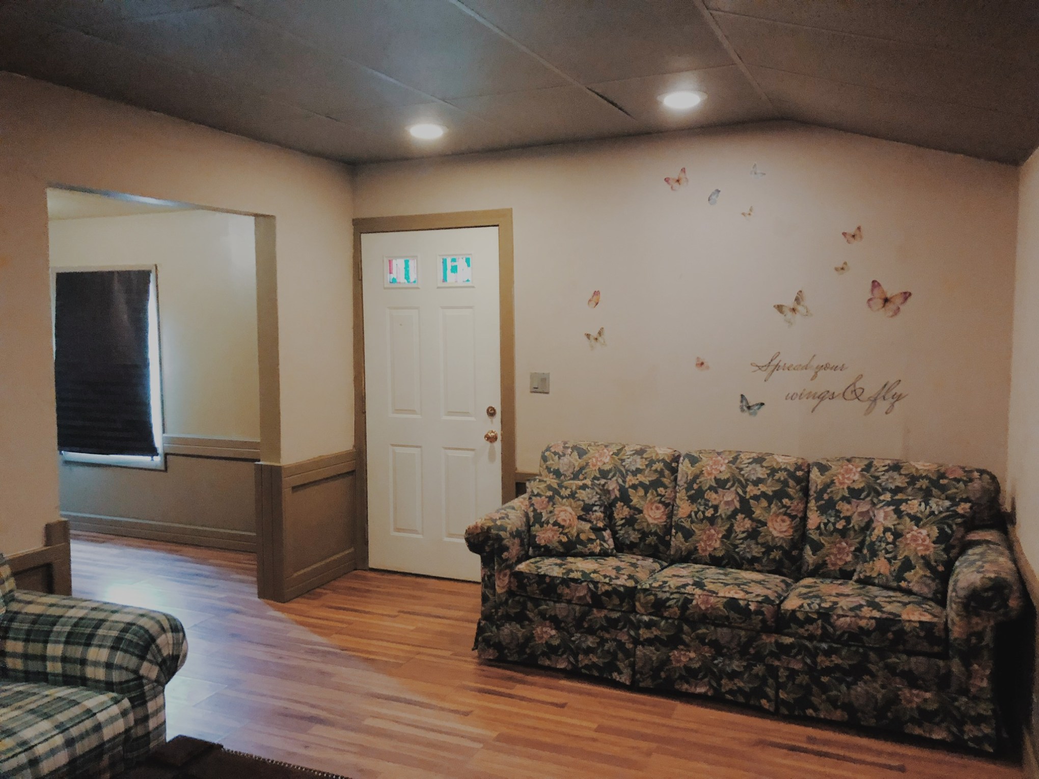 a bedroom with a bed in a room