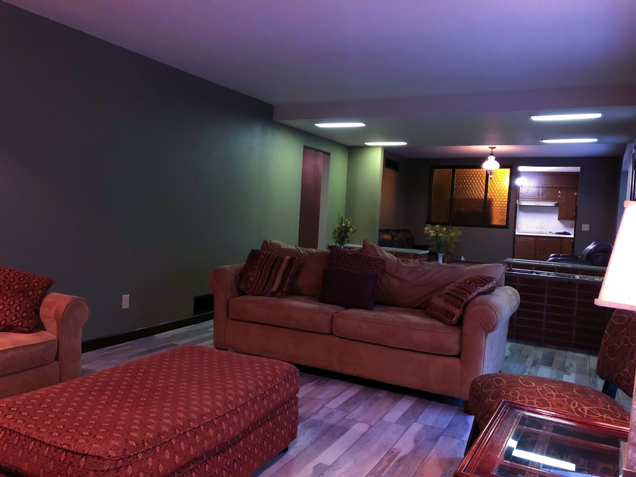 a bedroom with a bed in a room