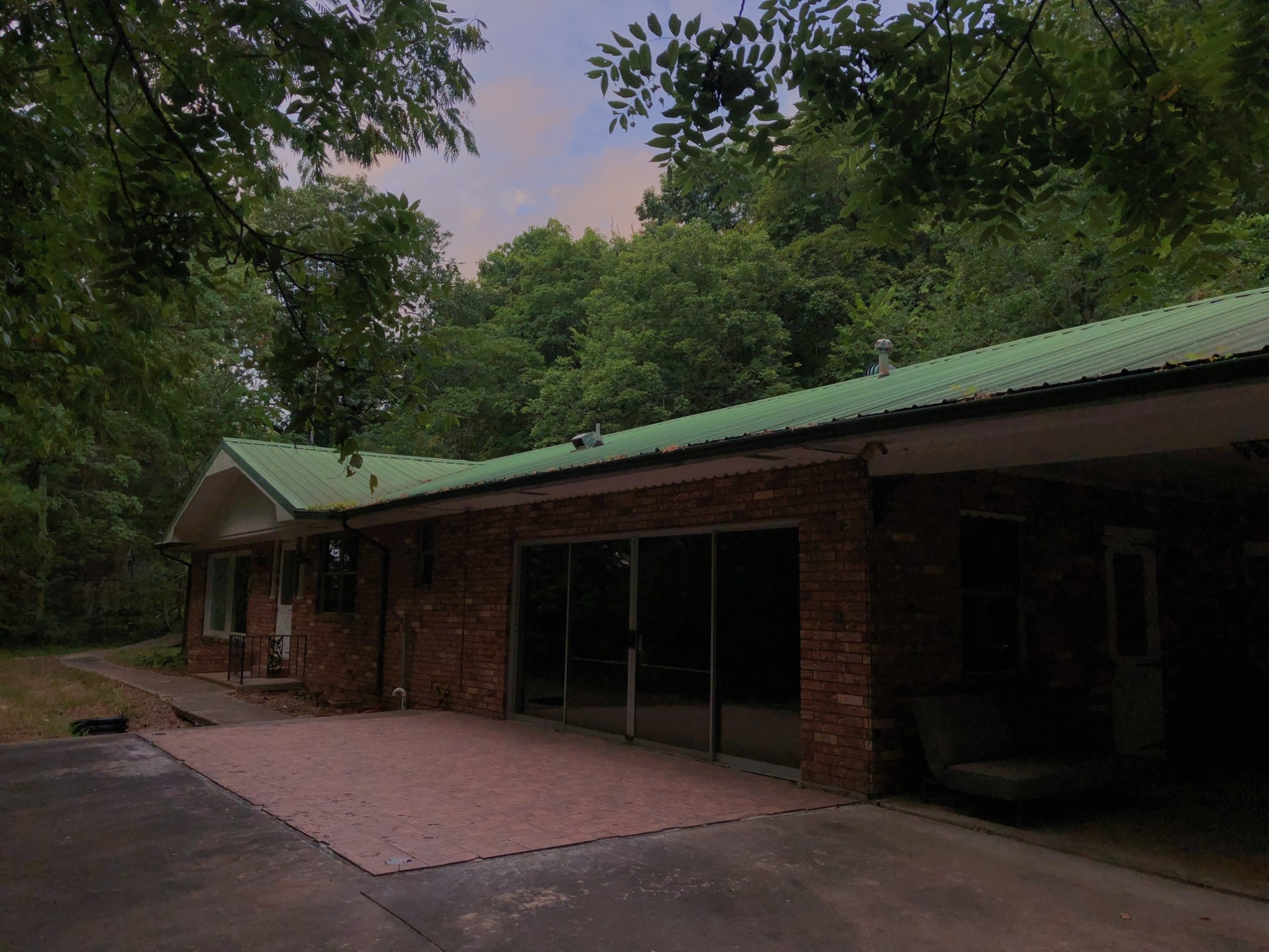 a house that is parked on the side of a building