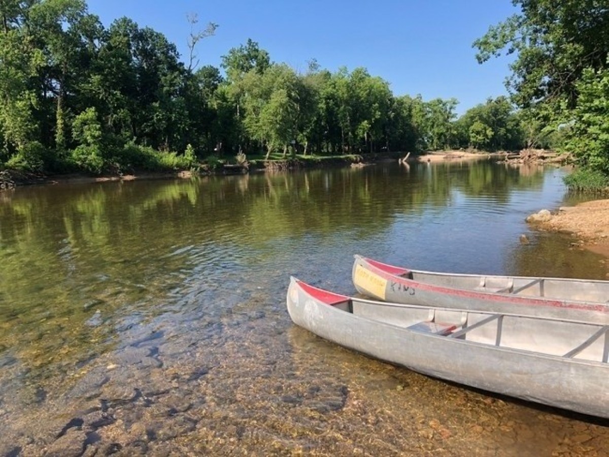 a small boat in a body of water